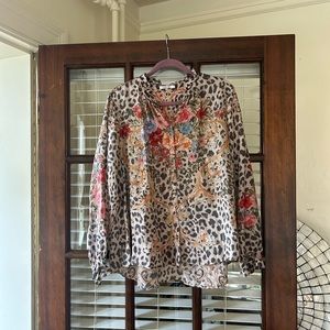 Pretty silk blouse worn once.  It’s size Large but it’s a  14/16 in my opinion